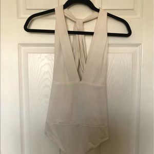 White comfortable v-neck bodysuit